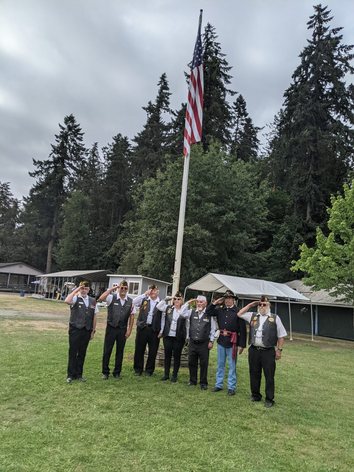 240455873_10223318562265986_3142971500304996741_n Two children posing with Santa Claus, full of excitement and joy.